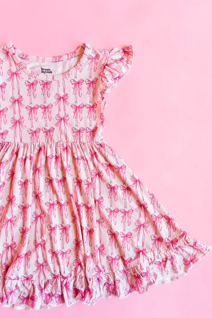 BOW CUTE DREAM RUFFLE DRESS