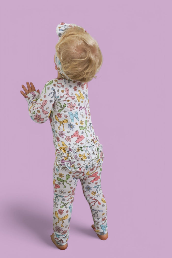 BOW GARDEN DREAM RUFFLE ROMPER